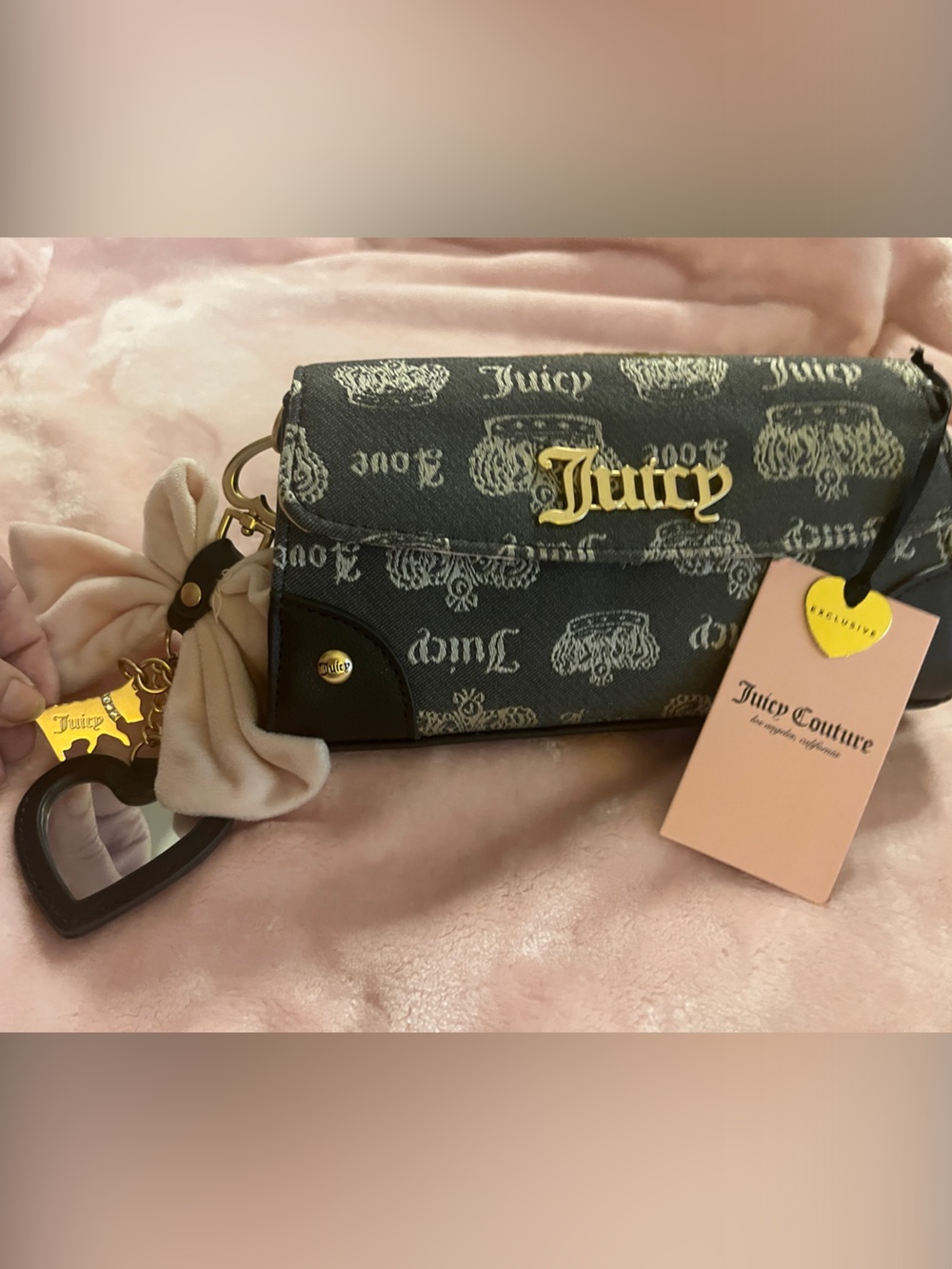 Juicy Couture crossbody or clutch with Gold Hardware with charm!!